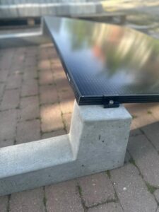 Side view of concrete mounting structure for photovoltaic panel installation