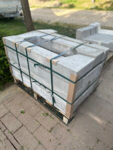 Palletized concrete solar mounting products prepared for transport