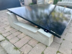 Concrete PV mounting system for flat roof solar panel installation