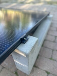 Concrete solar panel mounting solution for commercial photovoltaic installations