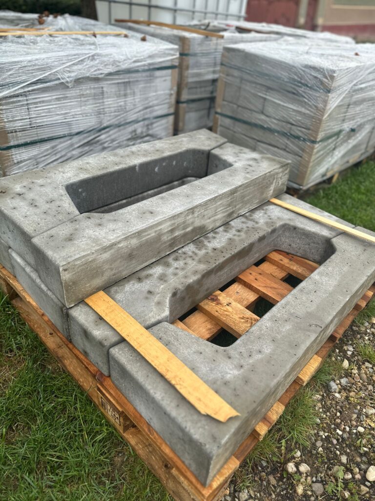 Concrete ballast blocks for flat roof solar installations prepared for delivery